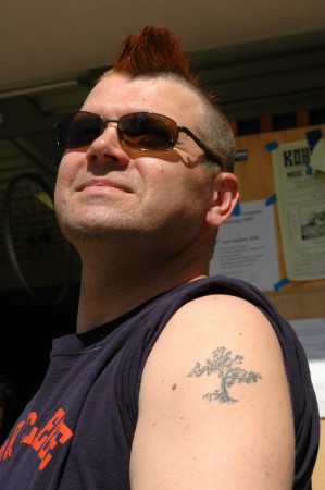 Jim mohawk and tattoo