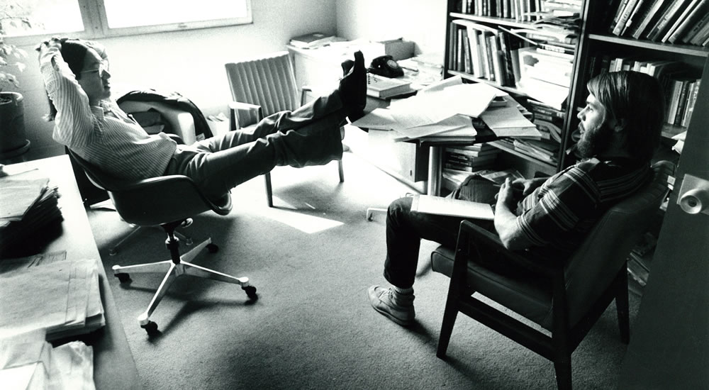 Rick Tsujimoto, professor of psychology, talks with a student in his office in 1977.