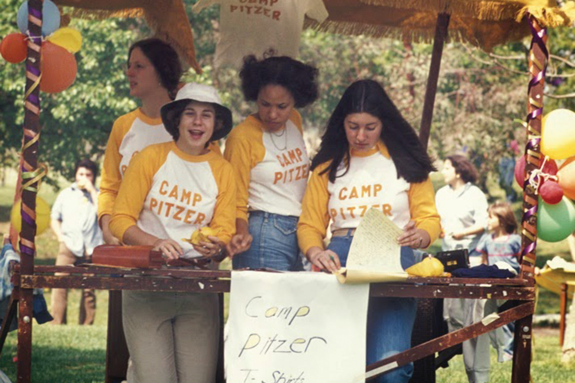 Student at Kohoutek 1976 with Camp Pitzer t-shirts