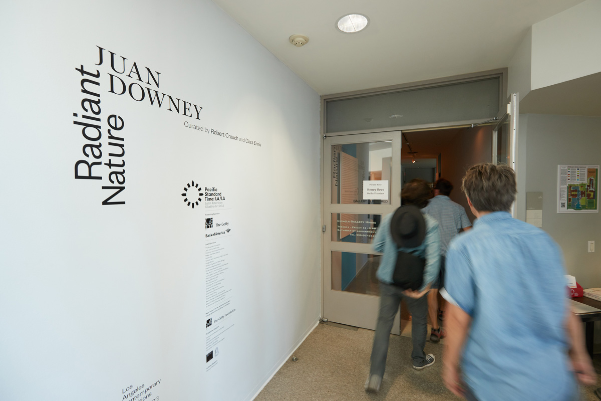 People enter the Nichols Gallery at Pitzer College.