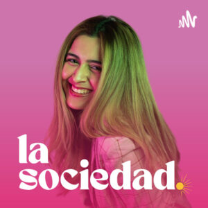 Diana Vicezar has long blond hair with dark colored roots and wears a plaid long-sleeved shirt. There is a pink background behind her and white text in the foreground that says la sociedad followed by a yellow period.