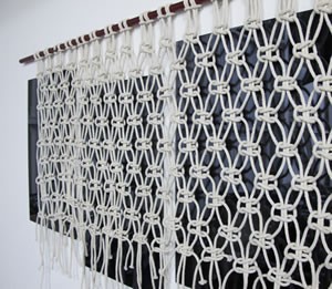 Detail, Black Flag Macramé (2013); Plexiglass mirror, aluminum rod, macramé rope, raku ceramic bead