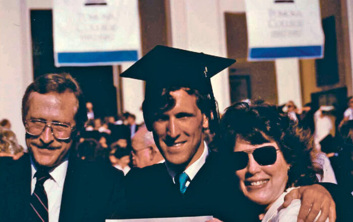 Strom with parents at Pomona graduation, 1988