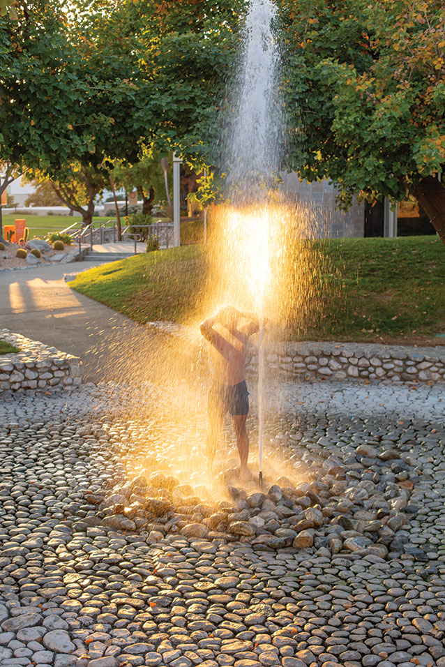 student bathing in fountain