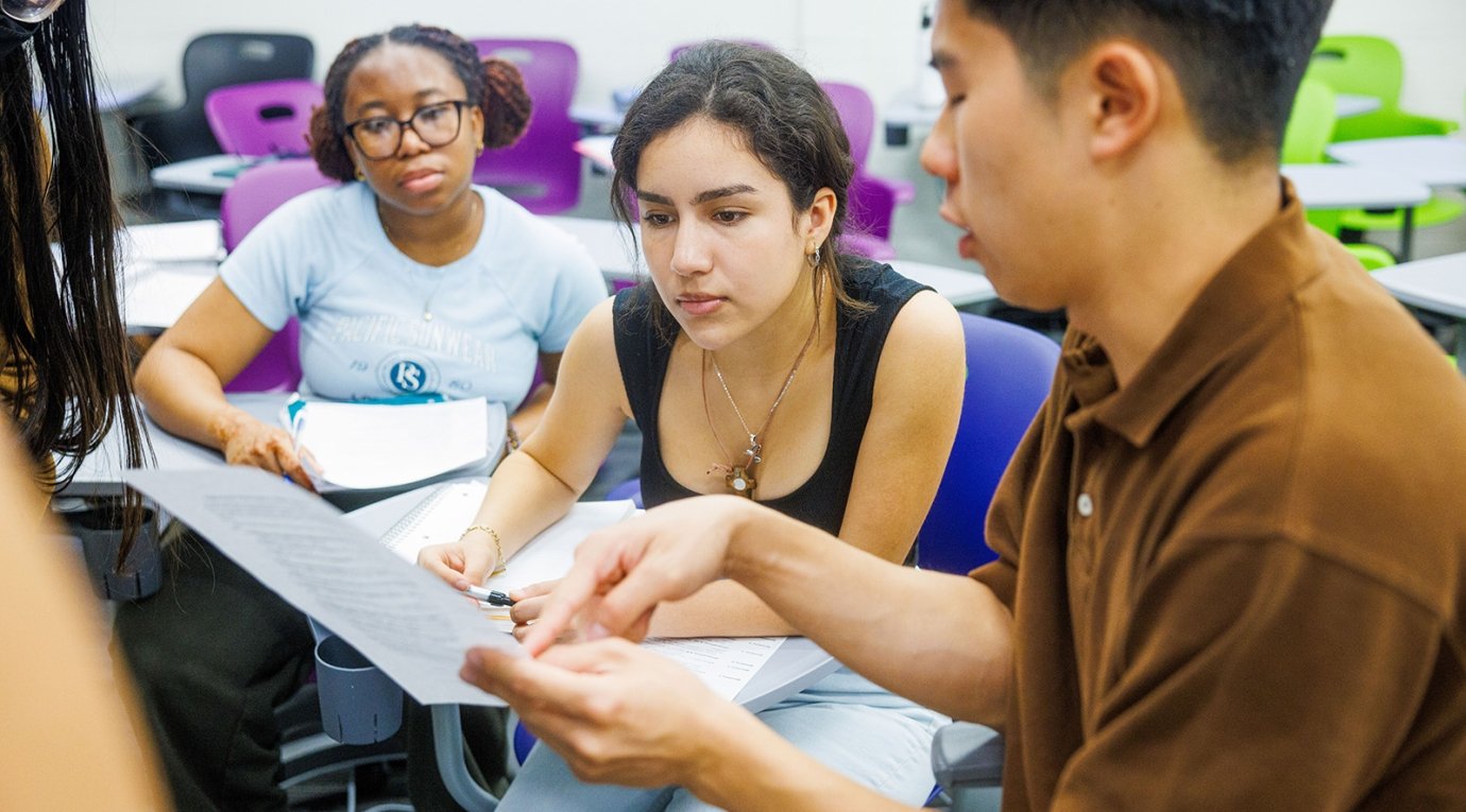 Students take part in a discussion during a sociology class