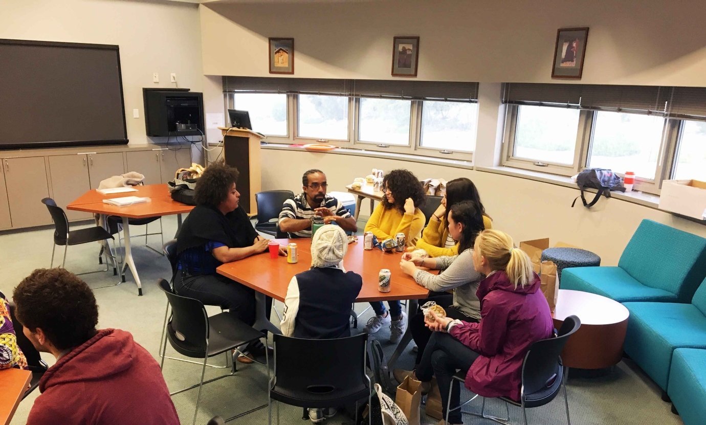 a group of students practice speaking portuguese at fletcher jones language lab