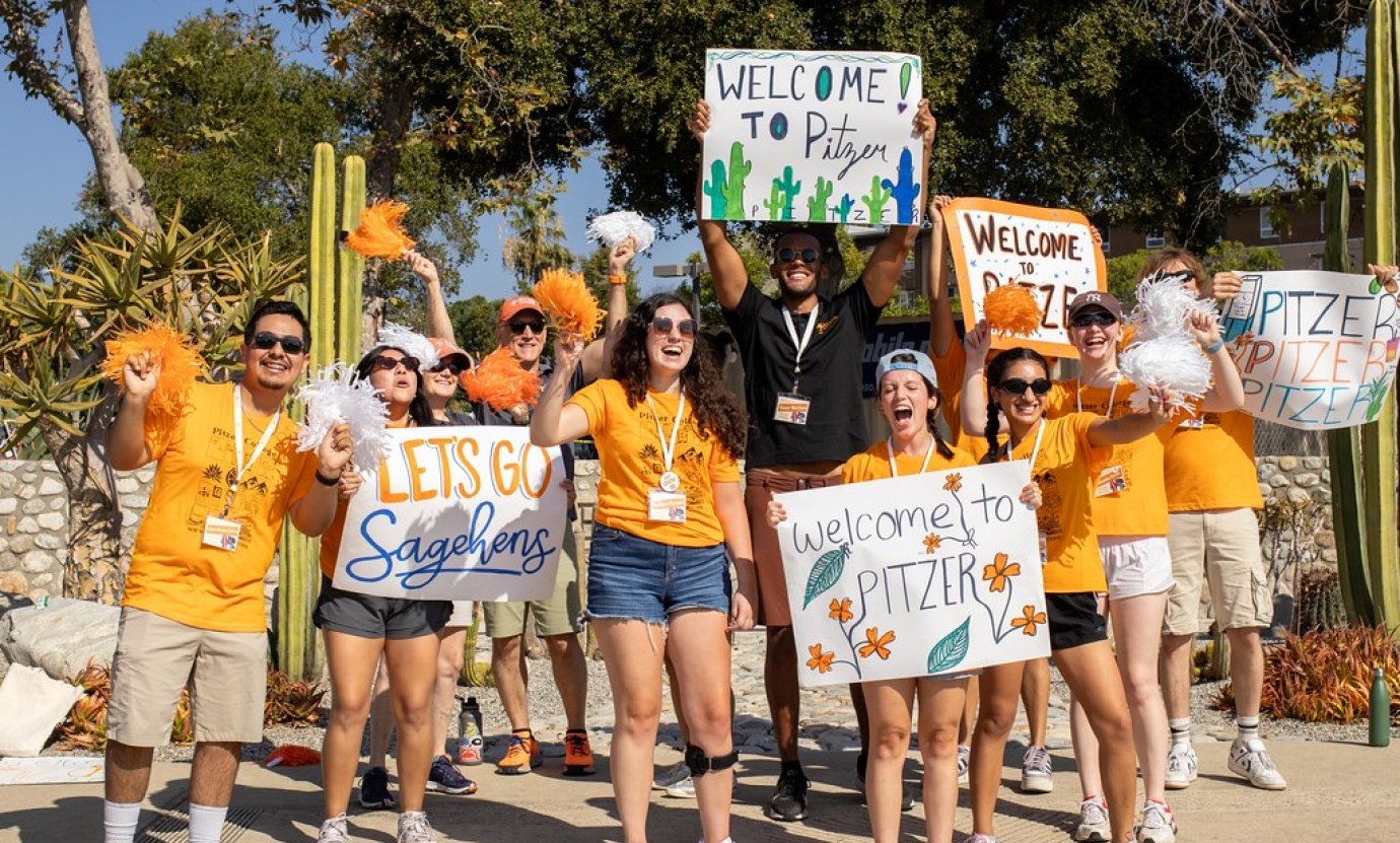 students with welcome signs