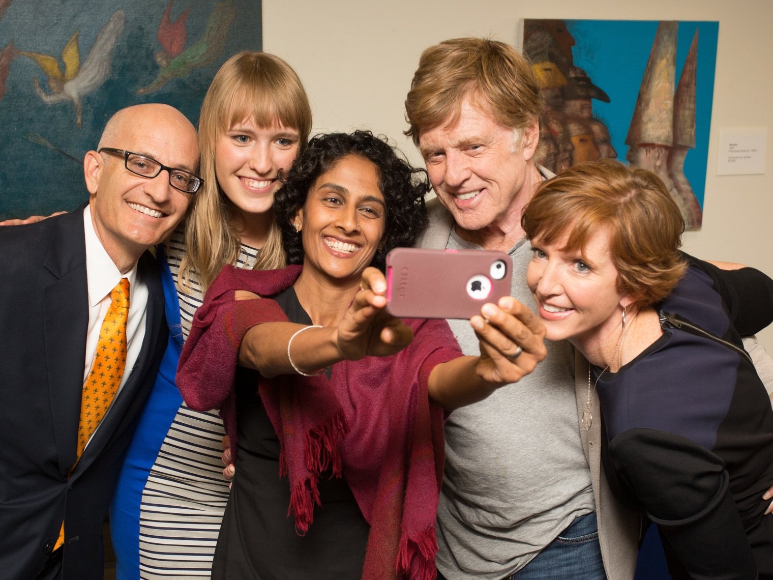 Robert Redford takes a selfie with some of the Pitzer College community