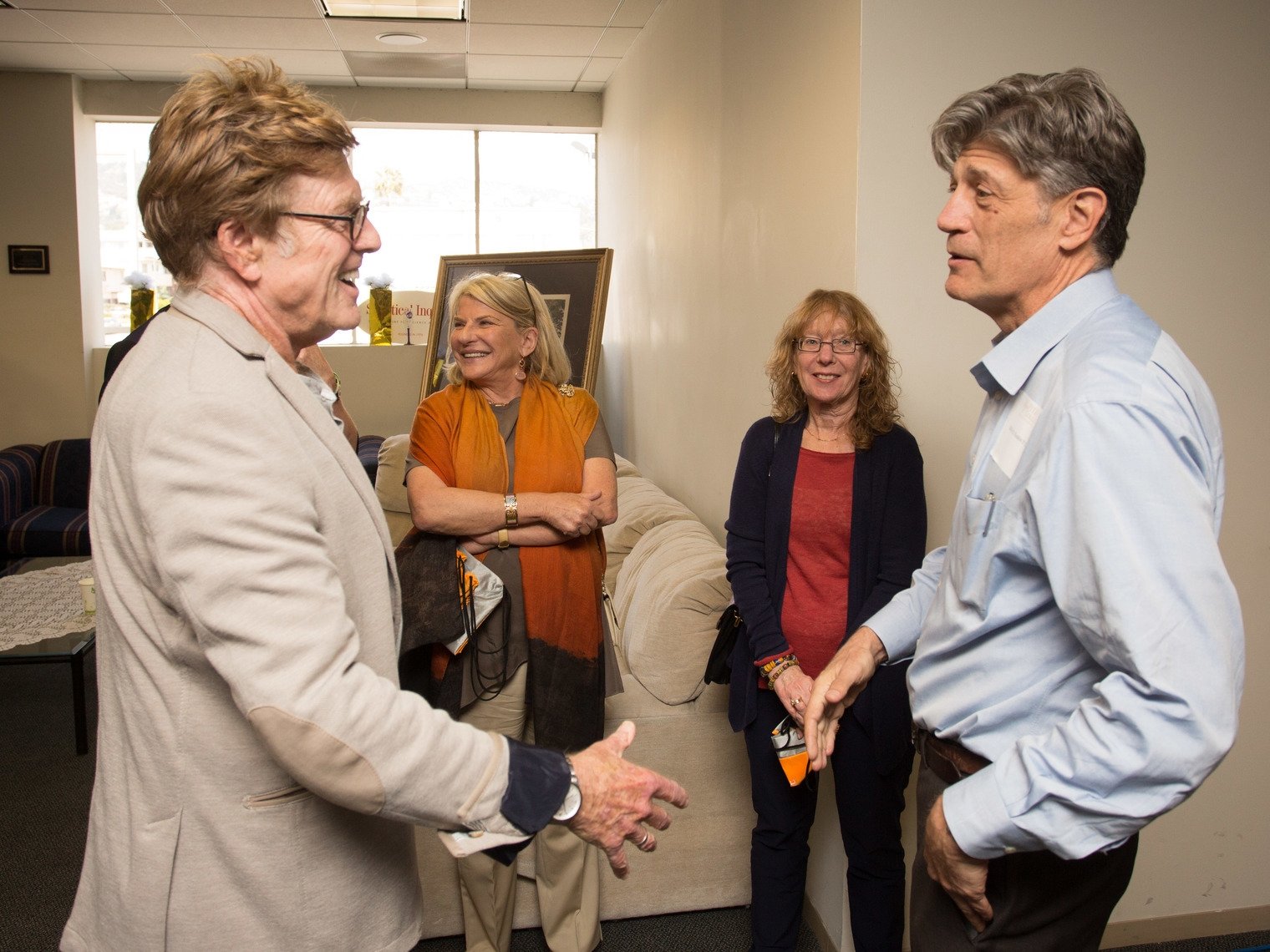 Robert Redford greets a Pitzer College community member