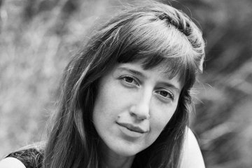 a black and white headshot of Isabel Neal