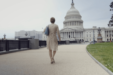woman walking to the capitol