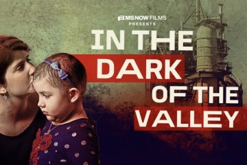 Film poster of woman kissing child's head