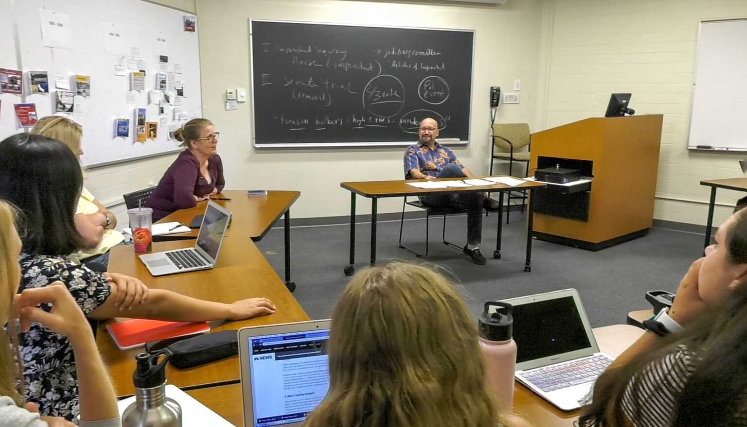 Professor Rachel VanSickle-Ward and Professor Adrian Pantoja lead a class discussion.