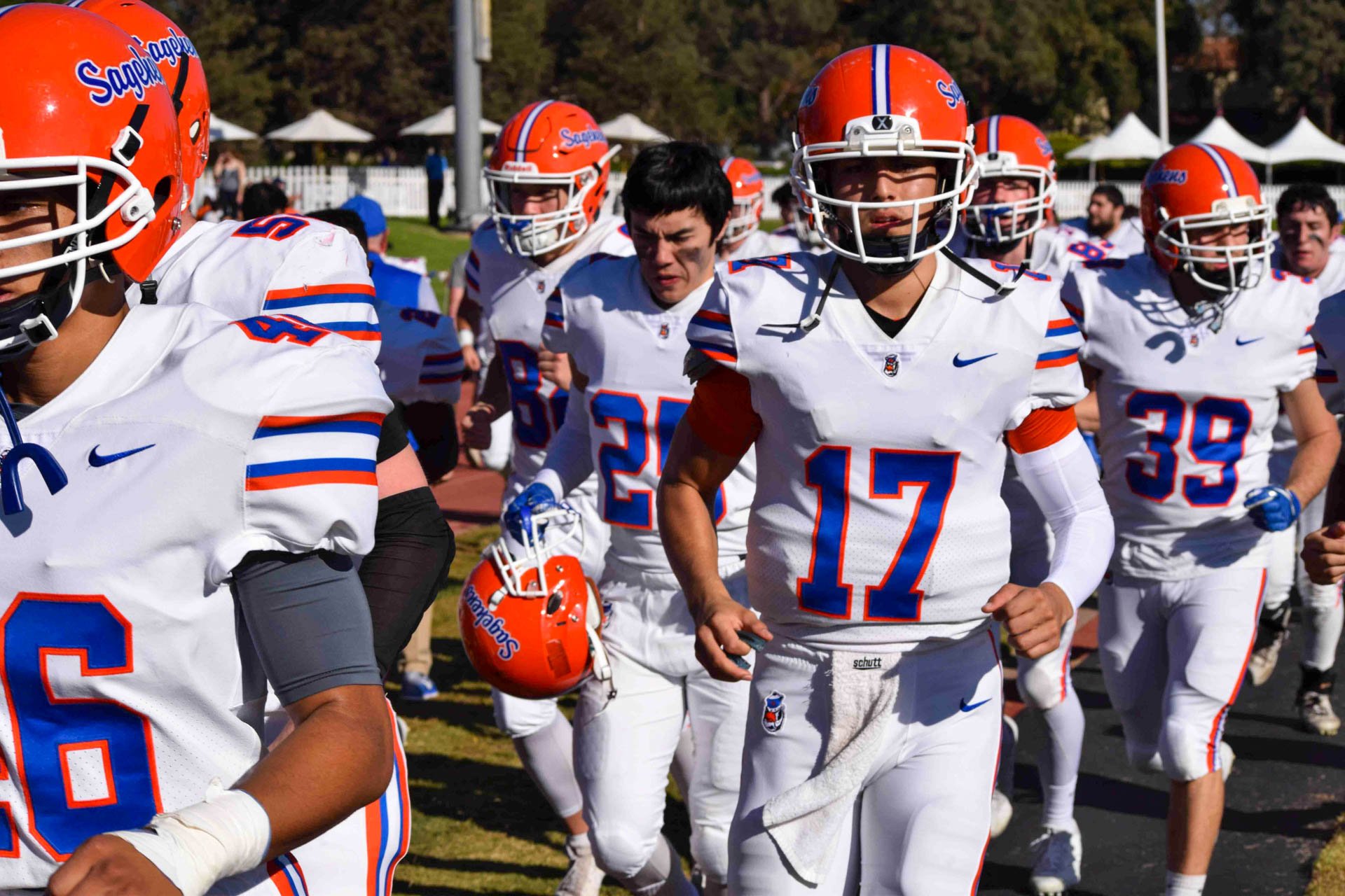 Sagehen football players take the field