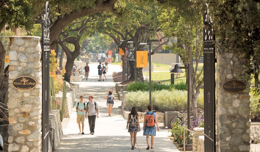 Pitzer College Gates with students walking