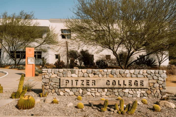 Image of Pitzer College Sign on a Cobblestone wall.