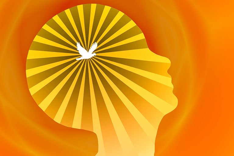 A dove radiates light inside a person's head