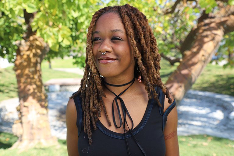 Chi Adi poses on the mounds