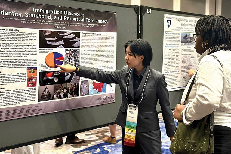 Ezriella Tange presents her poster at the American Anthropological Association annual meeting