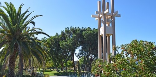Photo of Clock Tower and surrounding green landscape