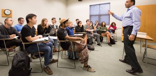 professor alwishah lectures to a group of philosophy students