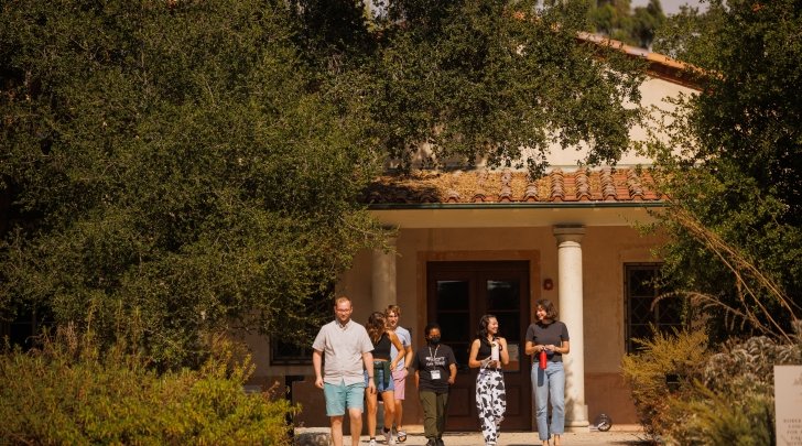 Students walk out of the Robert Redford Conservancy building