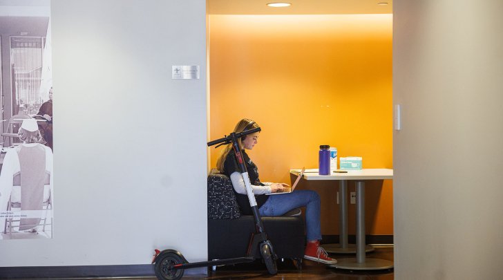 a student studies in a skandera hall study nook