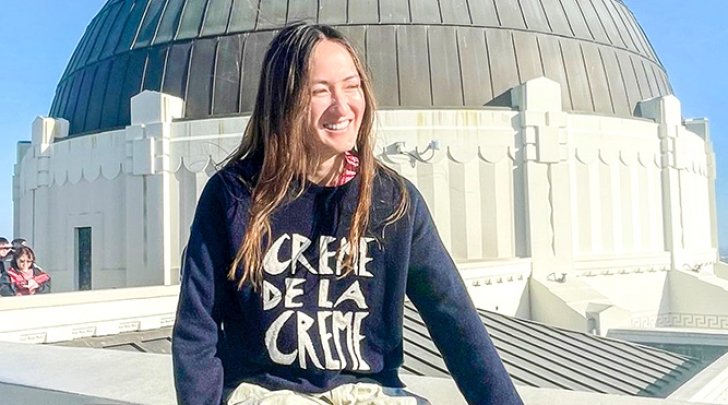 Scotia Rollins sits in front of Griffith Observatory