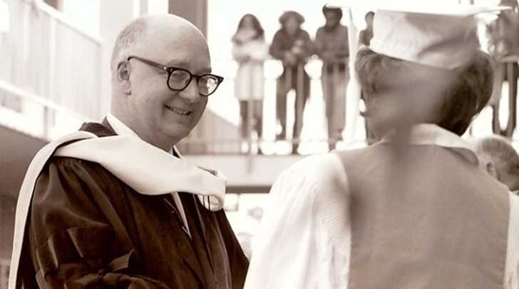 president atherton congratulates a graduate in 1970