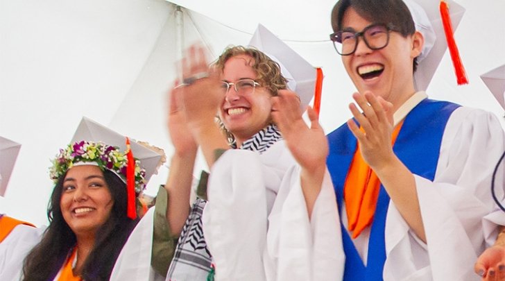 Pitzer students give a standing ovation during commencement
