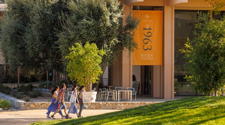a group of students walk in front of McConnell Center