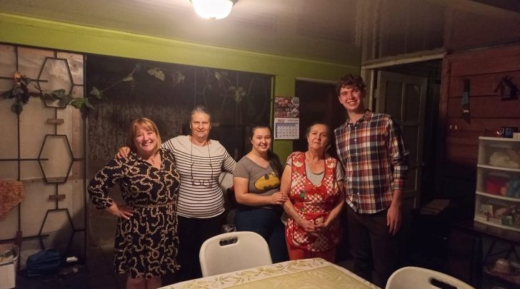Group photo in host family home