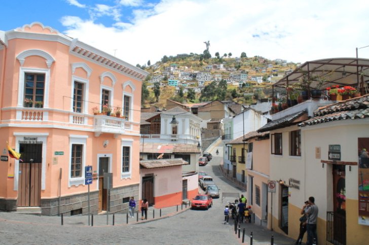historic center of Quito showing pink and white buildings