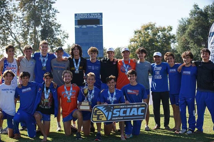 the Sagehen Men's Cross Country team poses as a group with the 2025 SCIAC championship banner