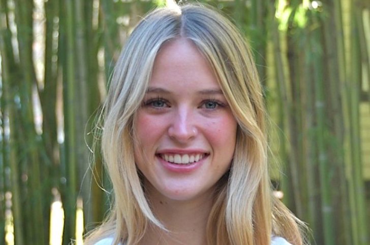 headshot of stella stringer with bamboo in the background