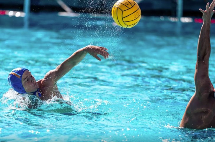 Chase Barman in the water during a water polo game