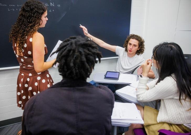 A Pitzer student presents during a discrete math class
