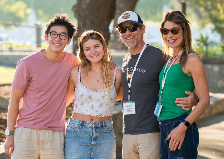 students and parents pose
