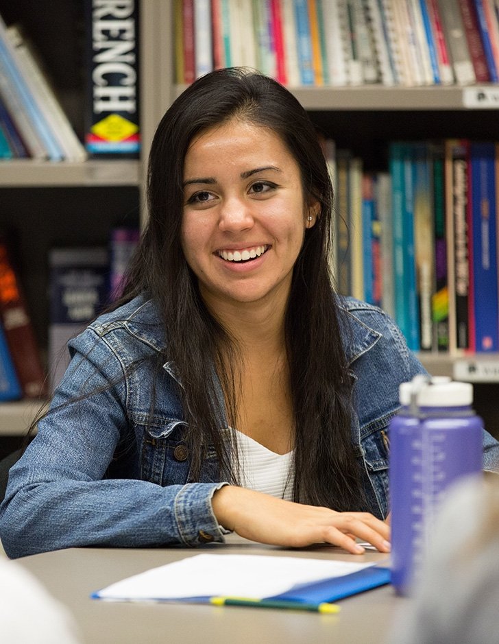 a language student participates in a langauge conversation table