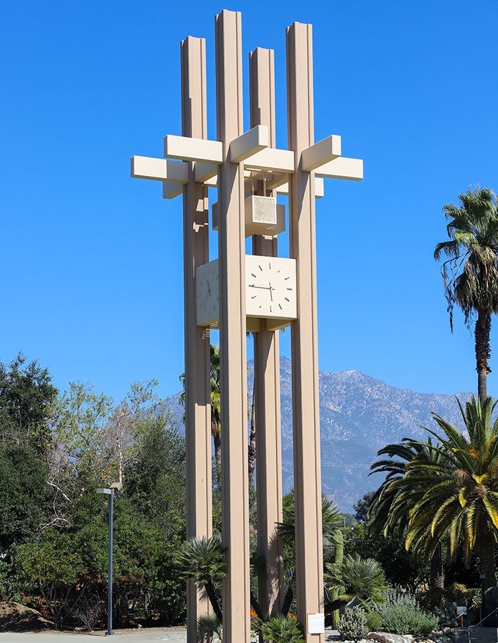 view of the brandt clock tower with the san bernardino mountains in the background