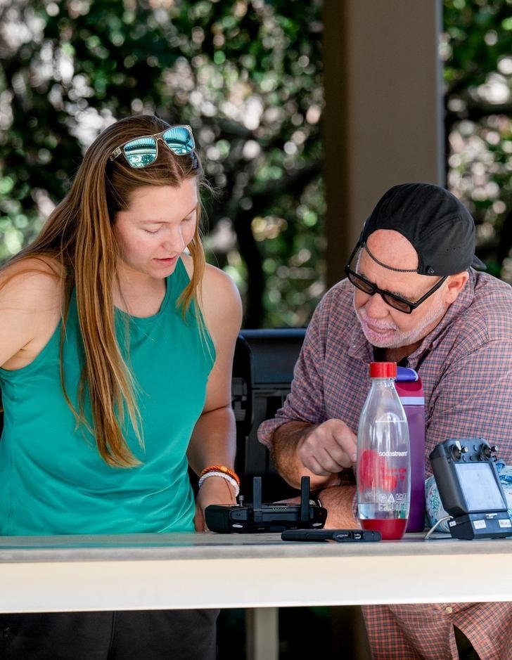 a student at the redford conservancy conducts research with a professor