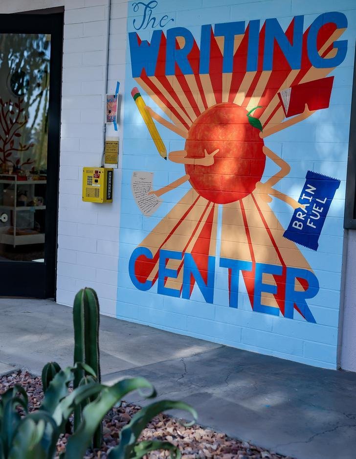 mural on the wall outside of the writing center