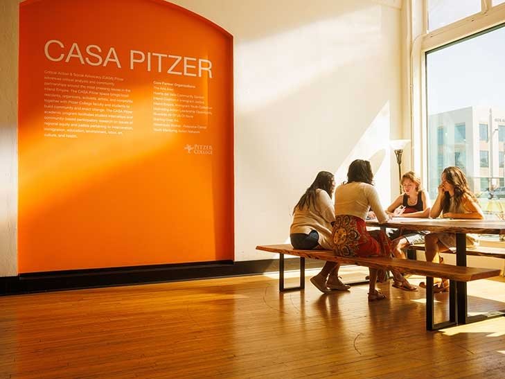 students sit at a table at Casa Pitzer