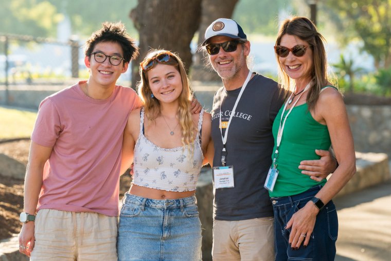 students and parents pose