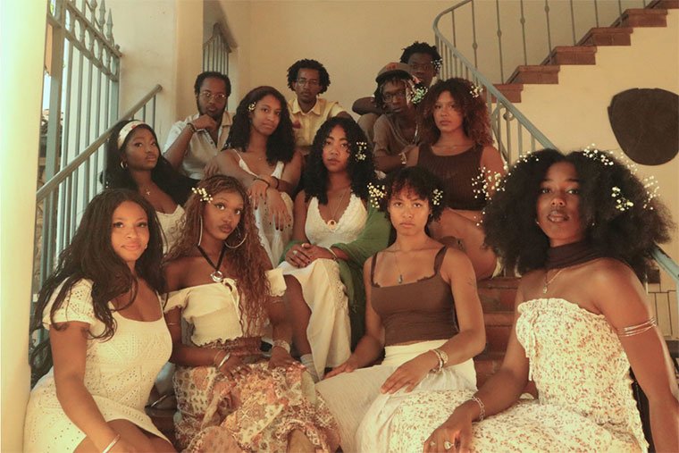 the Earth Tones pose on a flight of stairs