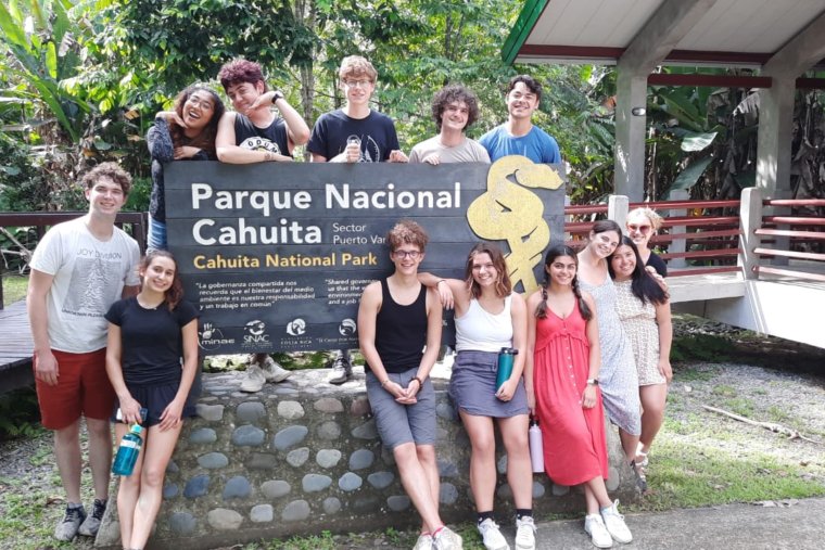 Group in front of national park sign