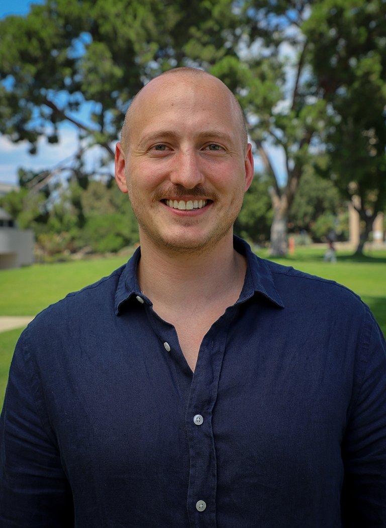 Pitzer philosophy professor Thomas Lambert