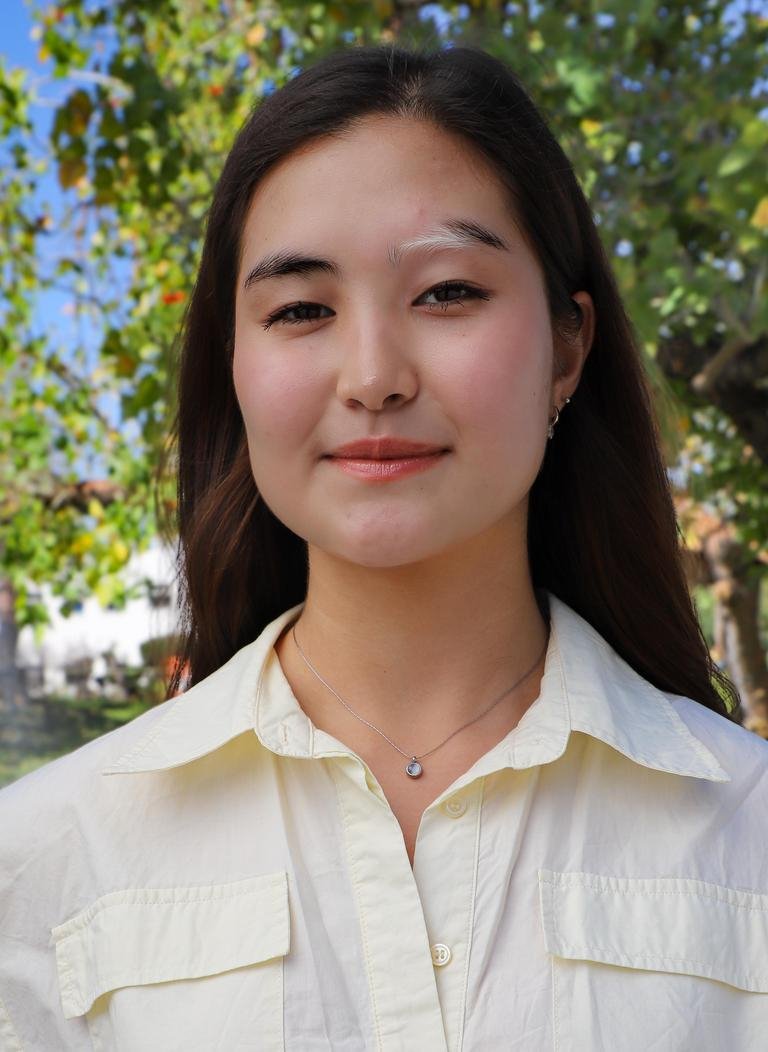 headshot of G Gulnaz Amanzholova