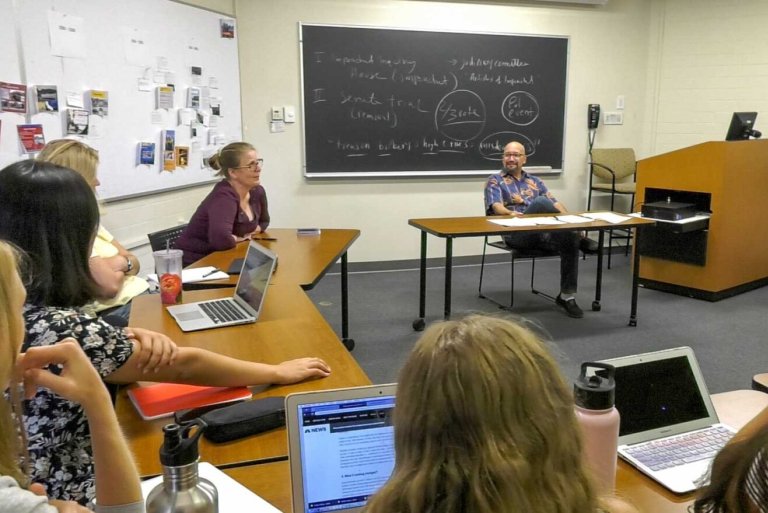 Professor Rachel VanSickle-Ward and Professor Adrian Pantoja lead a class discussion.