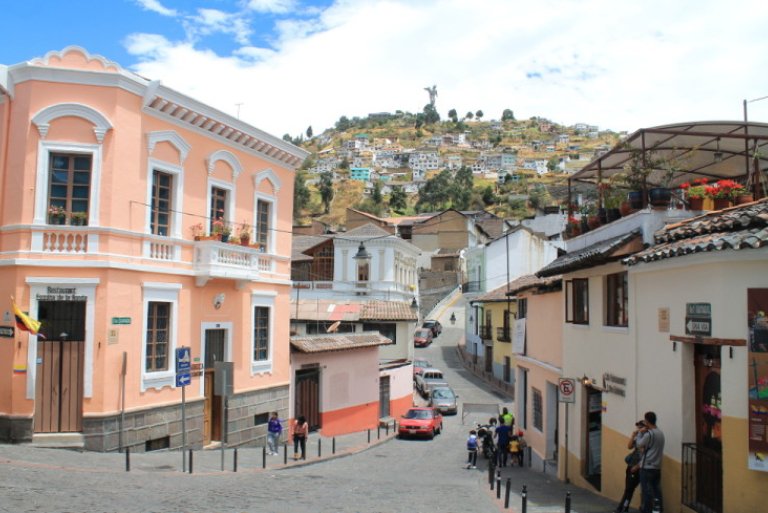 historic center of Quito showing pink and white buildings